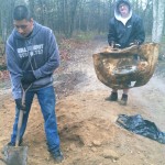 Participants performing clean up work