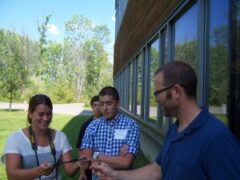 Participants learn about bird banding with David