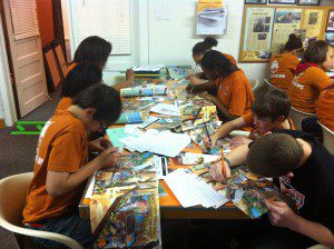 Compass group working on posters