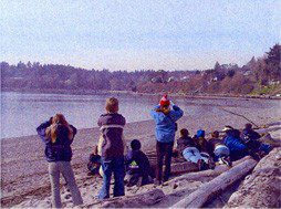 Participants bird watch and relax by the lake