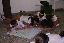 Participants working together on their projects