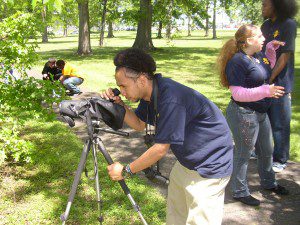 Worker bird watching with equipment