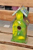 finished green bird house