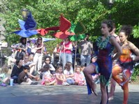 women dancing and performing in costumes